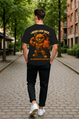 Oversized I Never Look Back Graphic T-Shirt – Powered by Pain Bear | Premium 240 GSM Cotton Streetwear Tee for Men